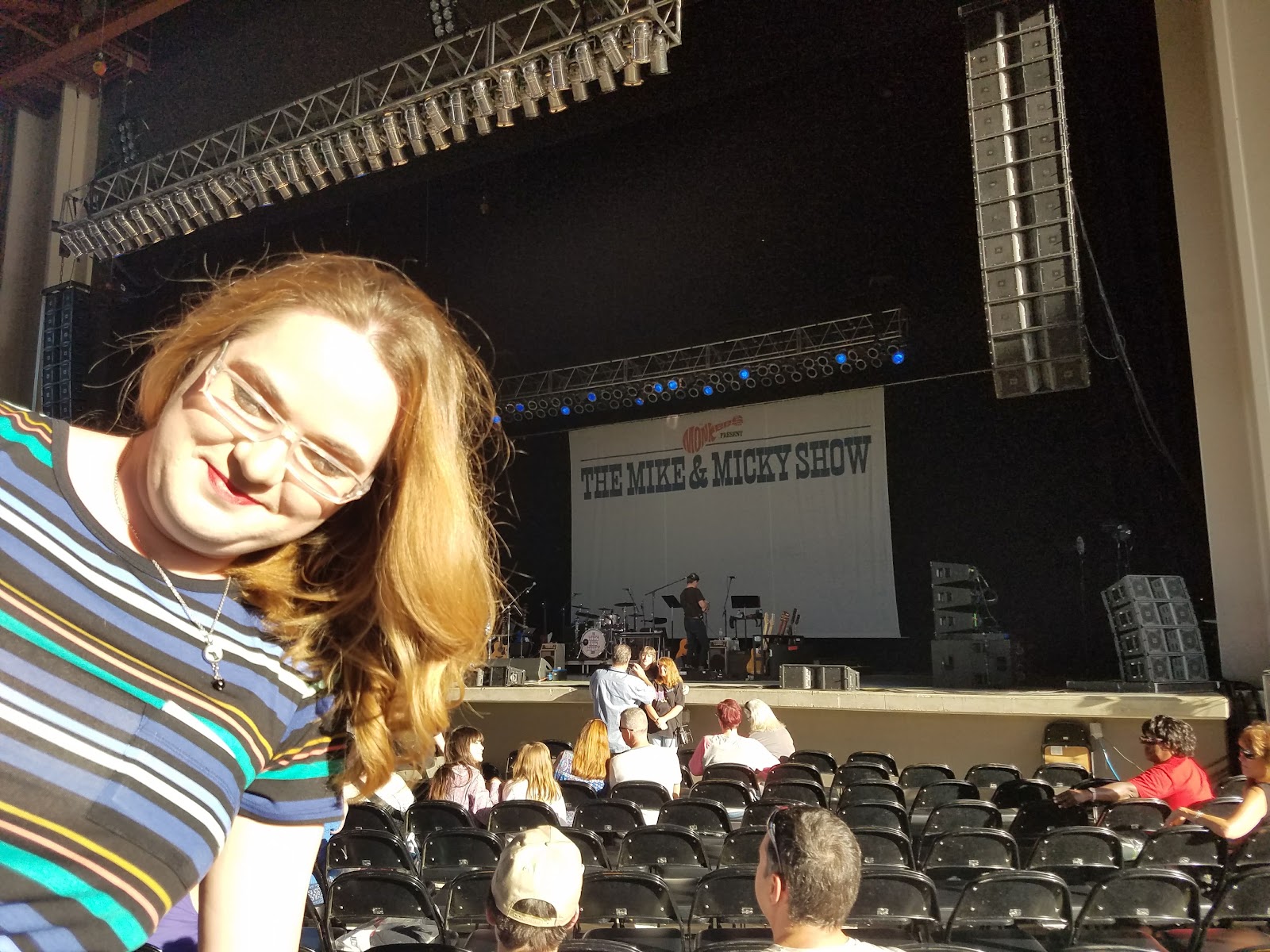 Megan, with the show behind her