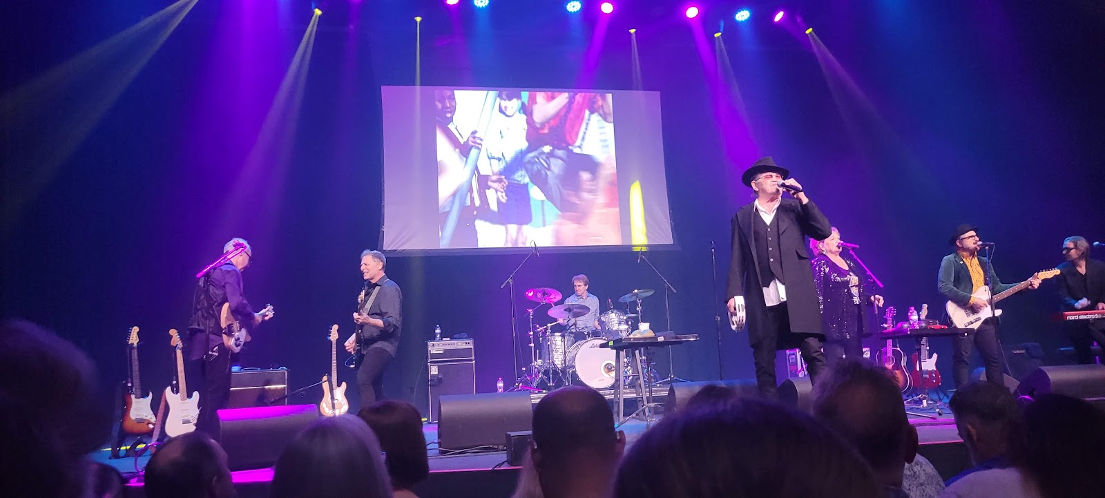 From the crowd, under the video screen